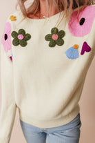 Knitted Flower Pattern Ribbed Edge Sweater